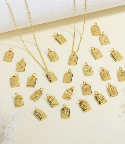 Gold Tag Letter Charm